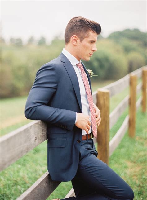 Sydney suit hire and sales. Groom style: Navy blue suit with pink patterned tie. Image ...