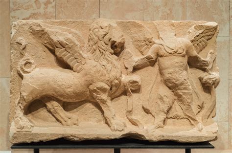 Sandstone Relief Of An Eros Holding Two Winged Lions From Flickr