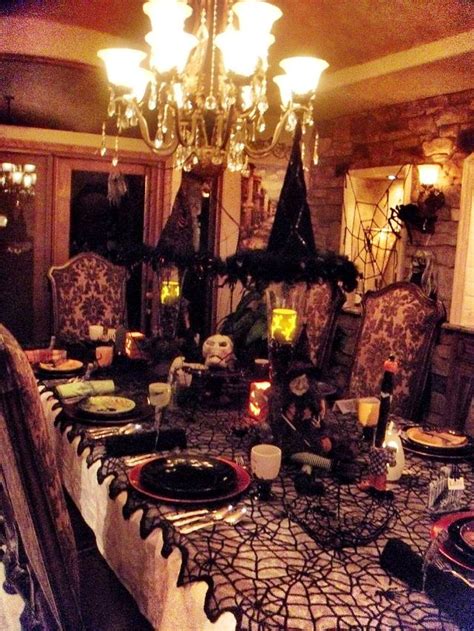 Halloween themed dinner party in black celebrations at home. 23 Halloween Dinner Decoration Ideas - Feed Inspiration