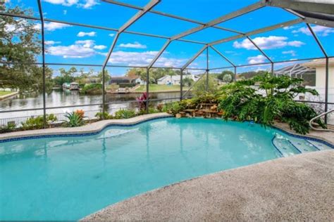 luxury pool home boat dock canal home recently updated close to golf f updated 2022