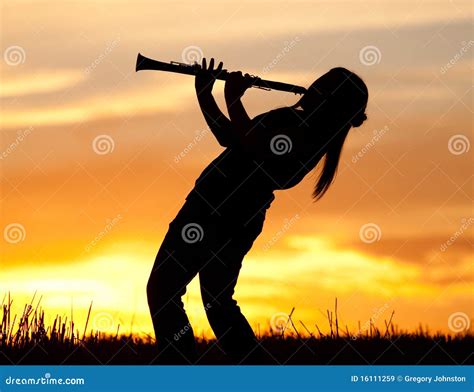 Playing The Clarinet At Sunset Stock Image Image Of Color Landscape