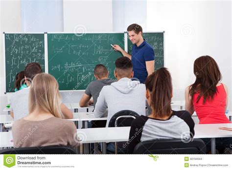 Teacher Teaching Mathematics To College Students Stock Photo - Image ...