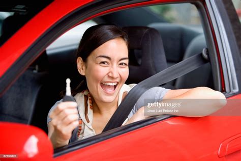 Asian Woman Holding Car Key In Car Photo Getty Images