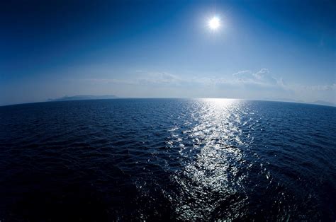 Bright Sun Shining Off The Ocean Waters Stockfreedom Premium Stock