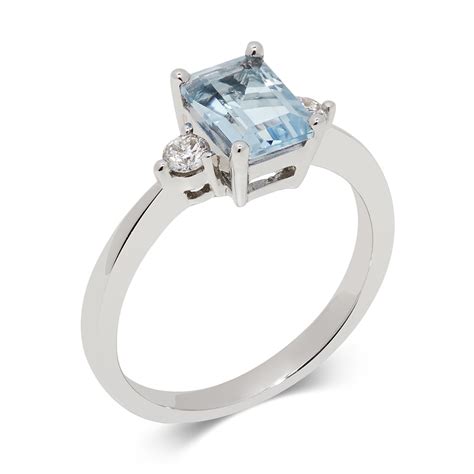D shaped band set with 8 diamonds. 18ct White Gold Emerald Cut Aquamarine and Diamond Ring ...
