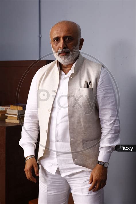 Image Of Indian Man Or Indian Old Man Or Politician Posing With An