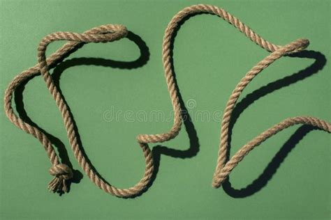 Close Up View Of Nautical Rope With Knots And Shadow Stock Image