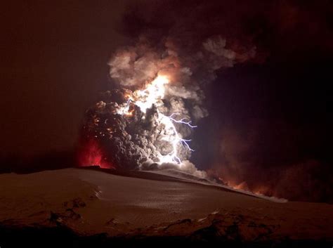 The Volcano Is Spewing Out Lava As It Erupts Into The Night Sky