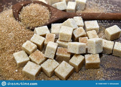 Different Types Of Brown Sugar With A Wooden Spoon Stock Image Image