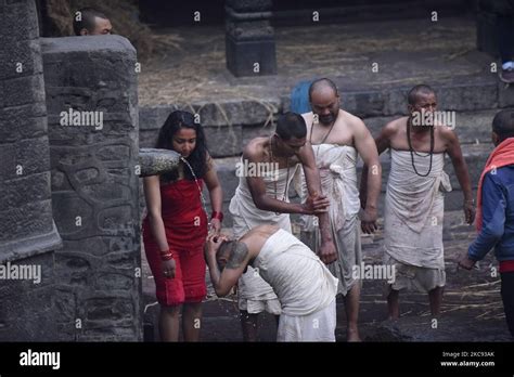 Nepalese Hindu Devotees Takes Bath After Offers Ritual Prayer During Madhav Narayan Festival Or