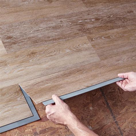 It uses the uniclick system like laminate flooring. TrafficMASTER Khaki Oak 6 in. x 36 in. Luxury Vinyl Plank Flooring (24 sq. ft. / case)-185312 ...