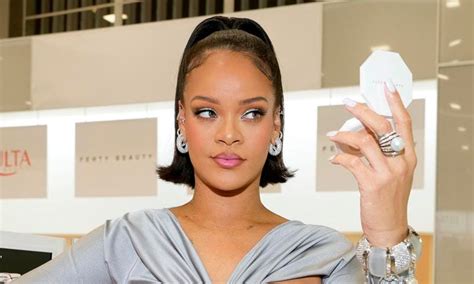 Rihanna Debuts Long Curtain Bangs