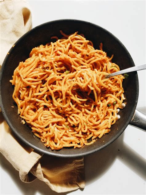 Sweet And Spicy Chili Garlic Noodles Standing In The Kitchen