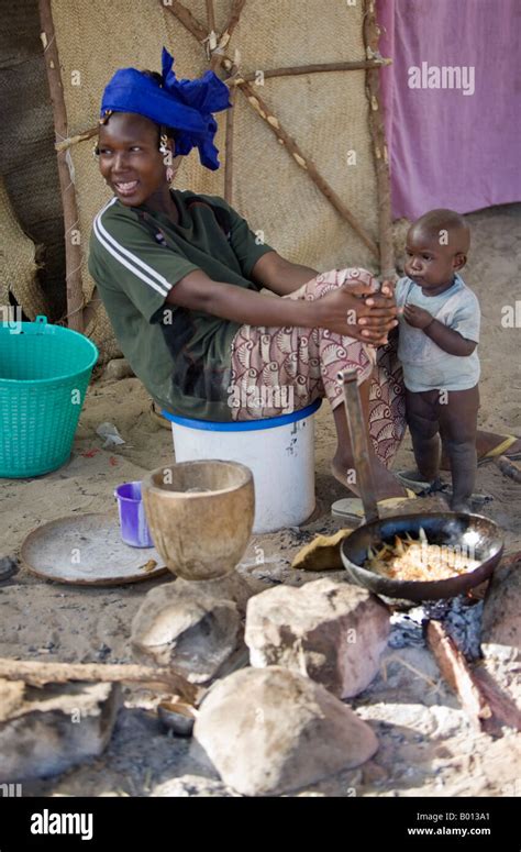 Mali Niger Inland Delta A Songhay Woman Frying Fish To Sell On A