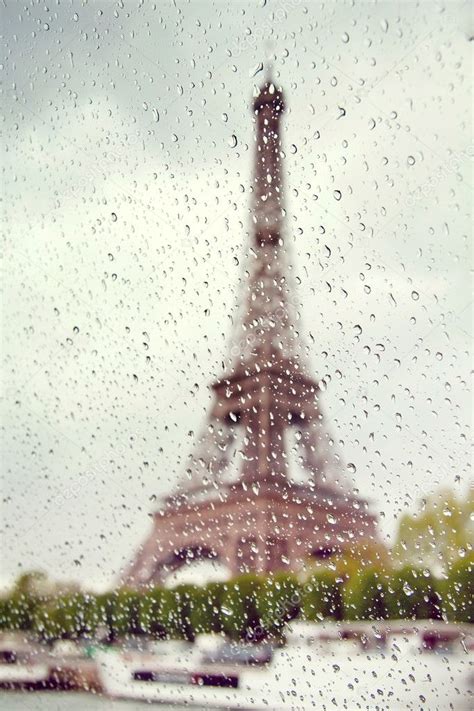 View On The Eiffel Tower Through The Window With Rain Drops France