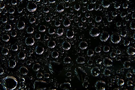 Water Droplets On Black Background 1864129 Stock Photo At Vecteezy