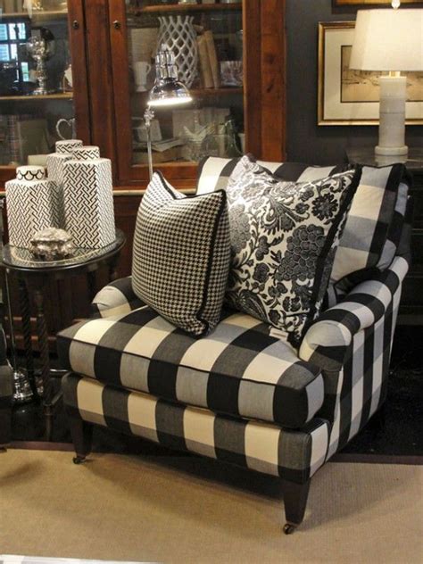 Stylish leather sling armchair with solid teak frame and premium leather. Covered in a classic black-and-white buffalo check, this ...