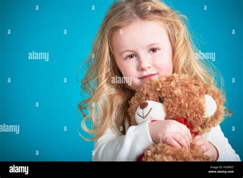 Fabulous Little Girl Hugging Brown Teddy Bear Stock Photo Alamy