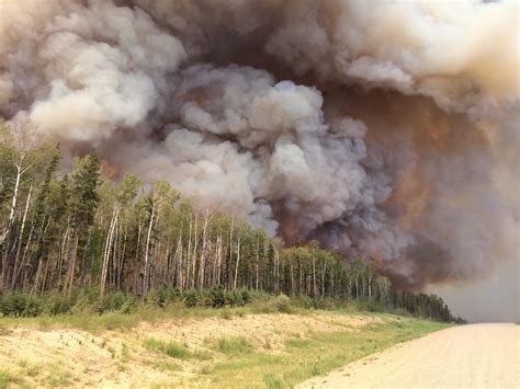 Wildfires In Canada And Alaska Drive Thousands From Homes New