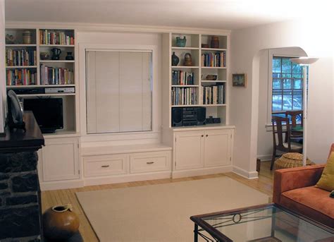 Go for chairs that take up less space (without arms or thinner legs), loveseats, ottomans, etc. Wall Units & Built-Ins