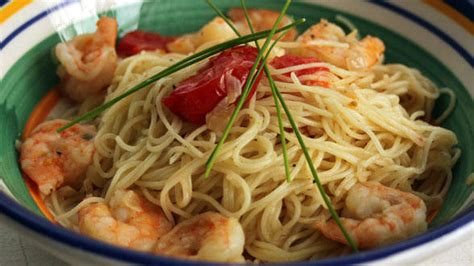 This shrimp scampi makes for a super easy family meal, but it's fancy enough for a nice dinner party. Baby Shrimp Scampi and Angel Hair Pasta - Rachael Ray