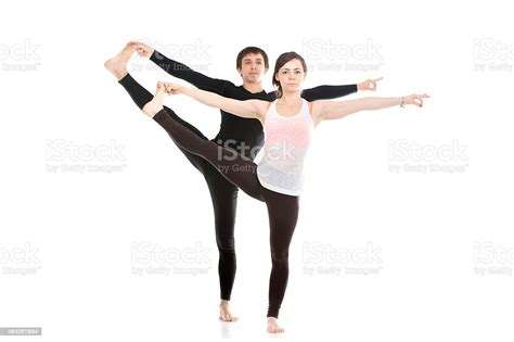 Extended Handtobigtoe Yoga Pose With Partner Stock Photo Download