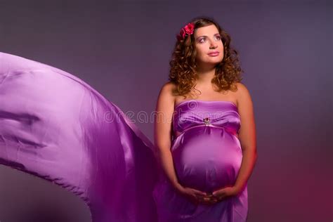 pregnant woman in pink and violet dress 1 stock image image of airy flying 22919973