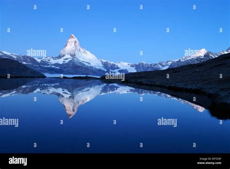 Mt Matterhorn Reflected In Stellisee Lake At Dusk Zermatt Canton Of