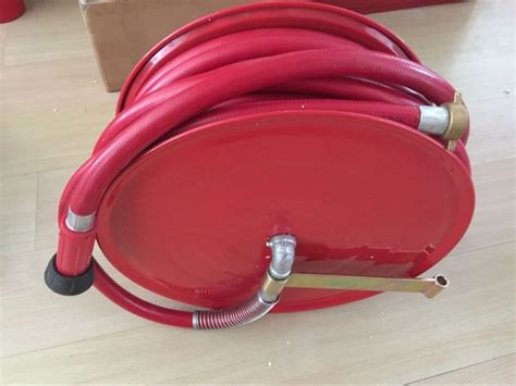 Fire Hose Reel With Meters Hose And Nozzle Provide An Accessible And Controlled Supply Of