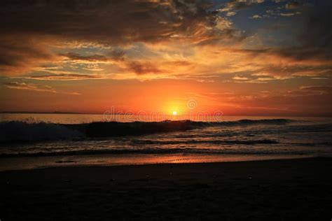 Golden Cloudy Sunset Ocean Stock Photo Image Of Ball 168757734