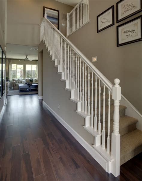 Tired of the look of your stair railings and banister? Love the white banister, wood floors, and the Wall color ...