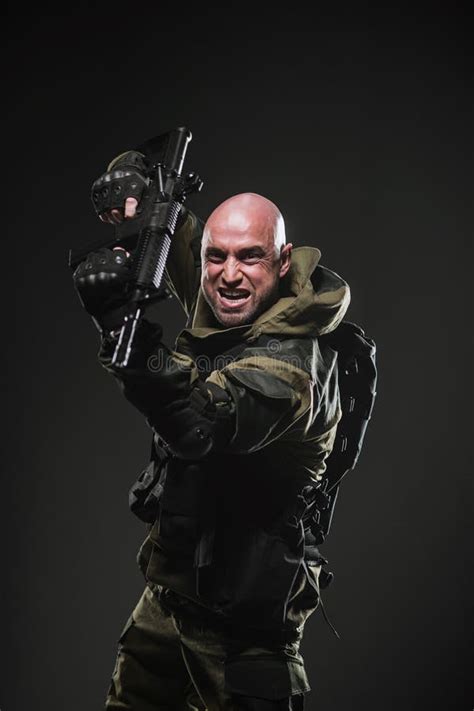 Soldier Man Hold Machine Gun On A Dark Background Stock Image Image