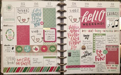 An Open Planner With Lots Of Stickers On It