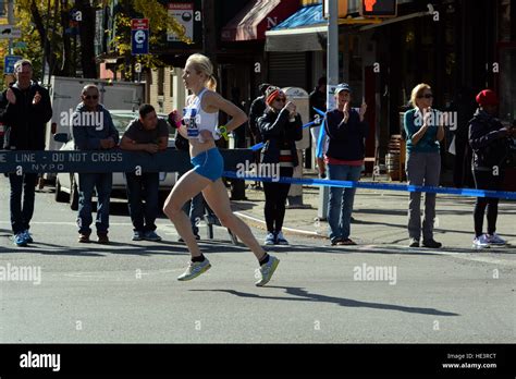 2016 Tcs New York City Marathon Runners Make Their Way Through Long