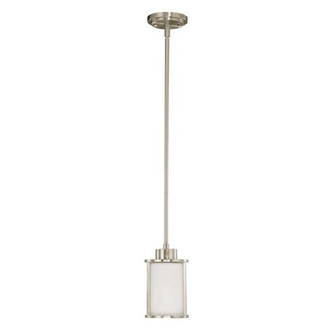 A Small Light Fixture With A White Glass Shade