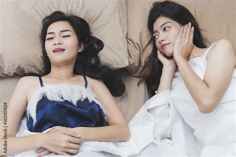 Snoring Woman Asian Girls Can Not Sleep Covering Ears With Hands For