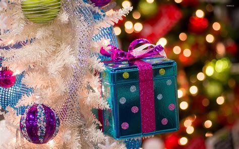 See more ideas about christmas wallpaper, holiday wallpaper, wallpaper. Small white Christmas tree in front of the Christmas ...