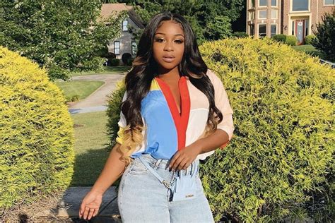 Reginae Carter Shows Off Her Cleavage In This Clip And Fans Say She Looks Like Her Mom Toya