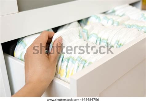 Stack Baby Disposable Diapers Pacifier Over Stock Photo 645484756