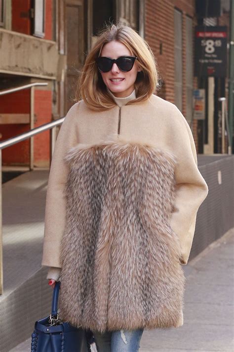 Olivia Palermo Wears Fur Coat With Ripped Denim Jeans In New York