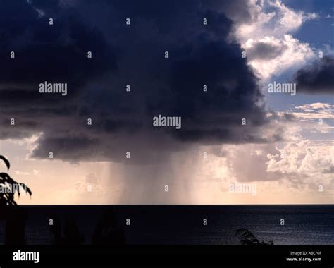 Rain Storm Over Ocean Stock Photo Alamy