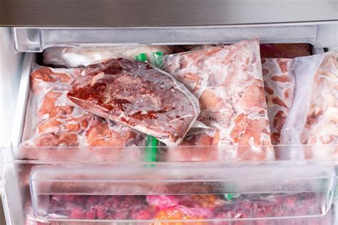 Frozen Meat And Meat Frozen Products In Plastic Package In The Freezer
