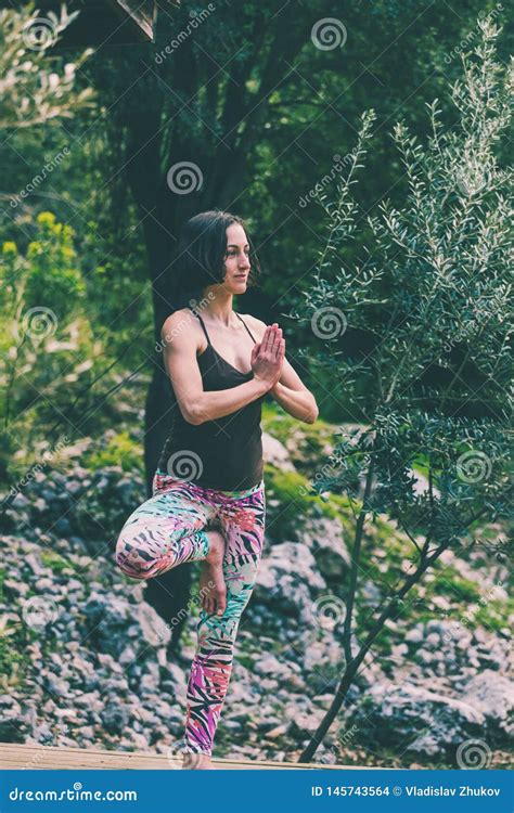 Woman Doing Yoga In Nature Stock Photo Image Of Fitness 145743564