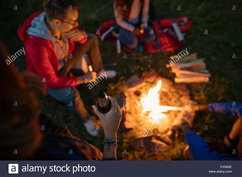 People Sitting Around Campfire Night Hi Res Stock Photography And