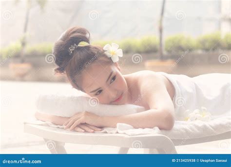 Beautiful Asian Woman Lying With Happy Mood On Vacation Daywellness Body Care And Spa