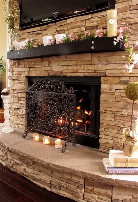 Glamorous Light Grey Mountain Blend Stacked Stone Fireplace With Black
