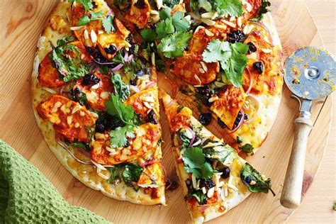 We may earn commission from the links on this page. Tandoori chicken pizza