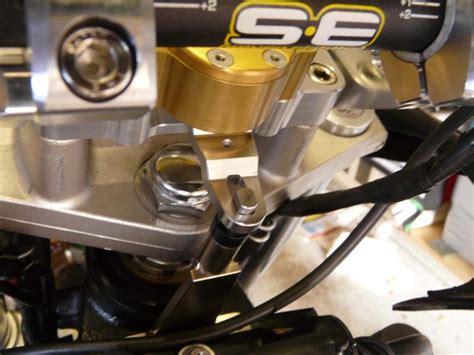 A steering damper is found on the installation of a steering damper is a straightforward process, with the most critical step being the it is also imperative to ensure the steering damper does not bind or make contact with any part of the. Scotts Steering Damper + 3.5inch ROX riser - Stromtrooper ...