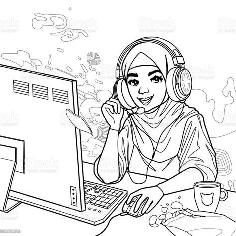 Muslim Girl Gamer Or Streamer In A Hijab And A Headset Sits At A
