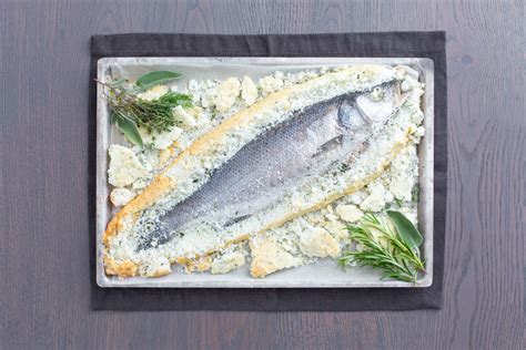 Sea Bass In A Herb Salt Crust Italian Recipes By Giallozafferano